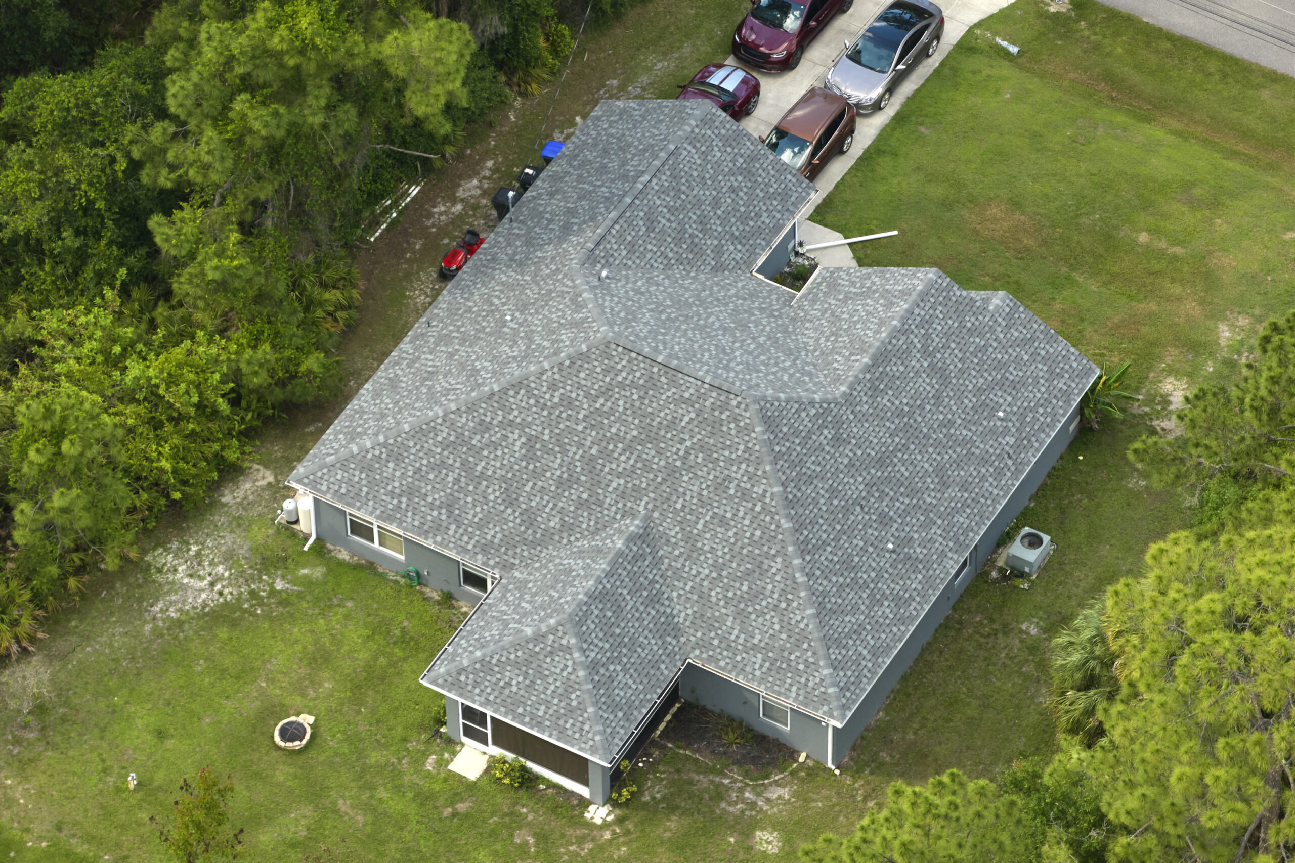 aerial view typical contemporary american private house with roof top covered with asphalt shingles green lawn yard scaled