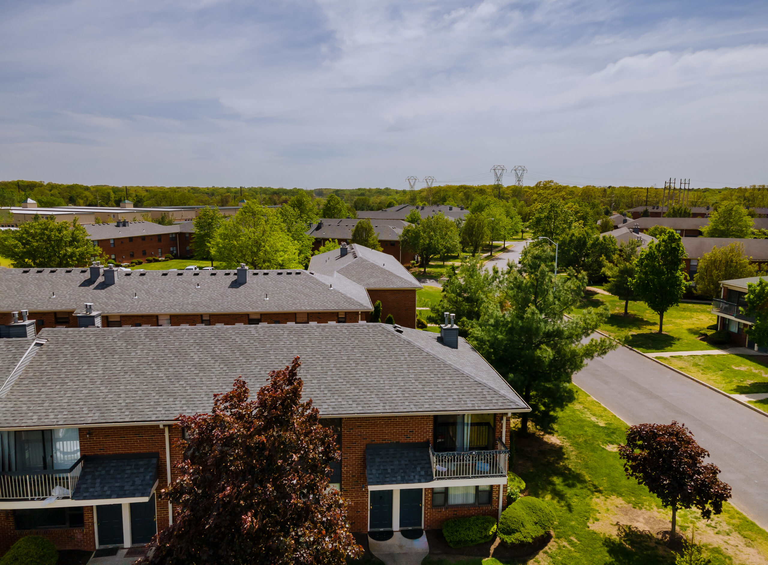 high angle view trees buildings against sky scaled